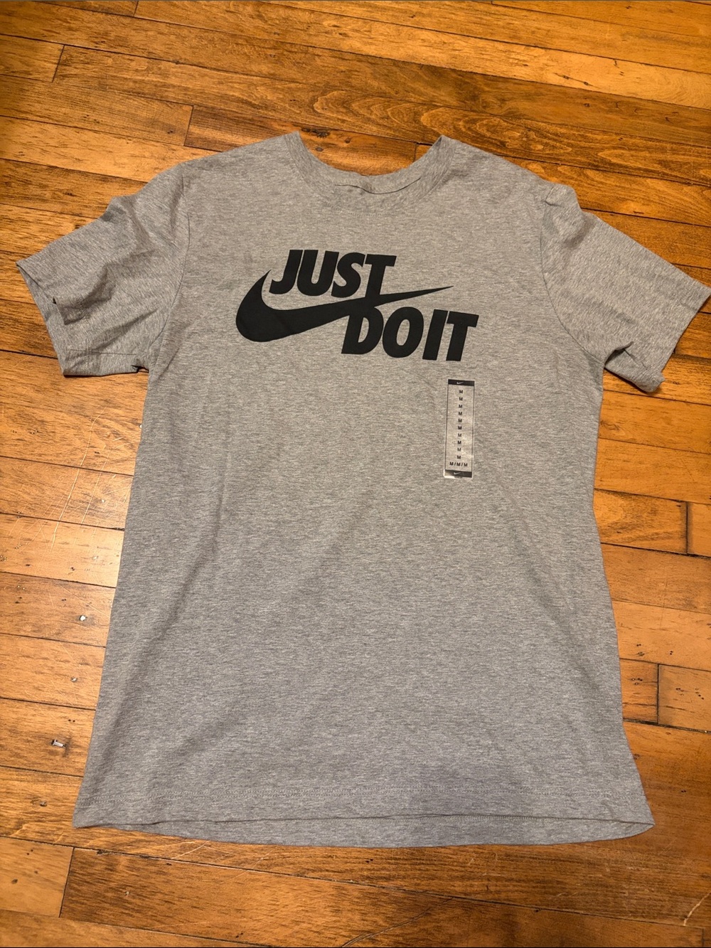 Nike Men’s Heather Gray 'Just Do It' Graphic Tee with Black Swoosh and Letters